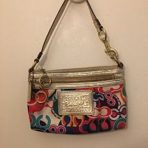 Coach clutch/wristlet